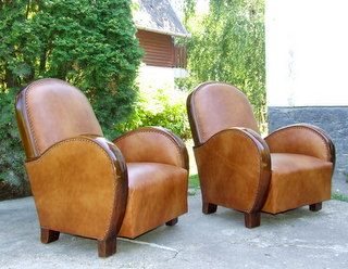 Art Deco leather armchairs.