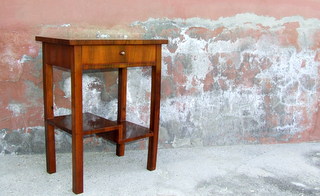 Art deco walnut telephone table.