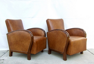 Art Deco leather armchairs.